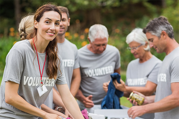 group of volunteers packing boxes